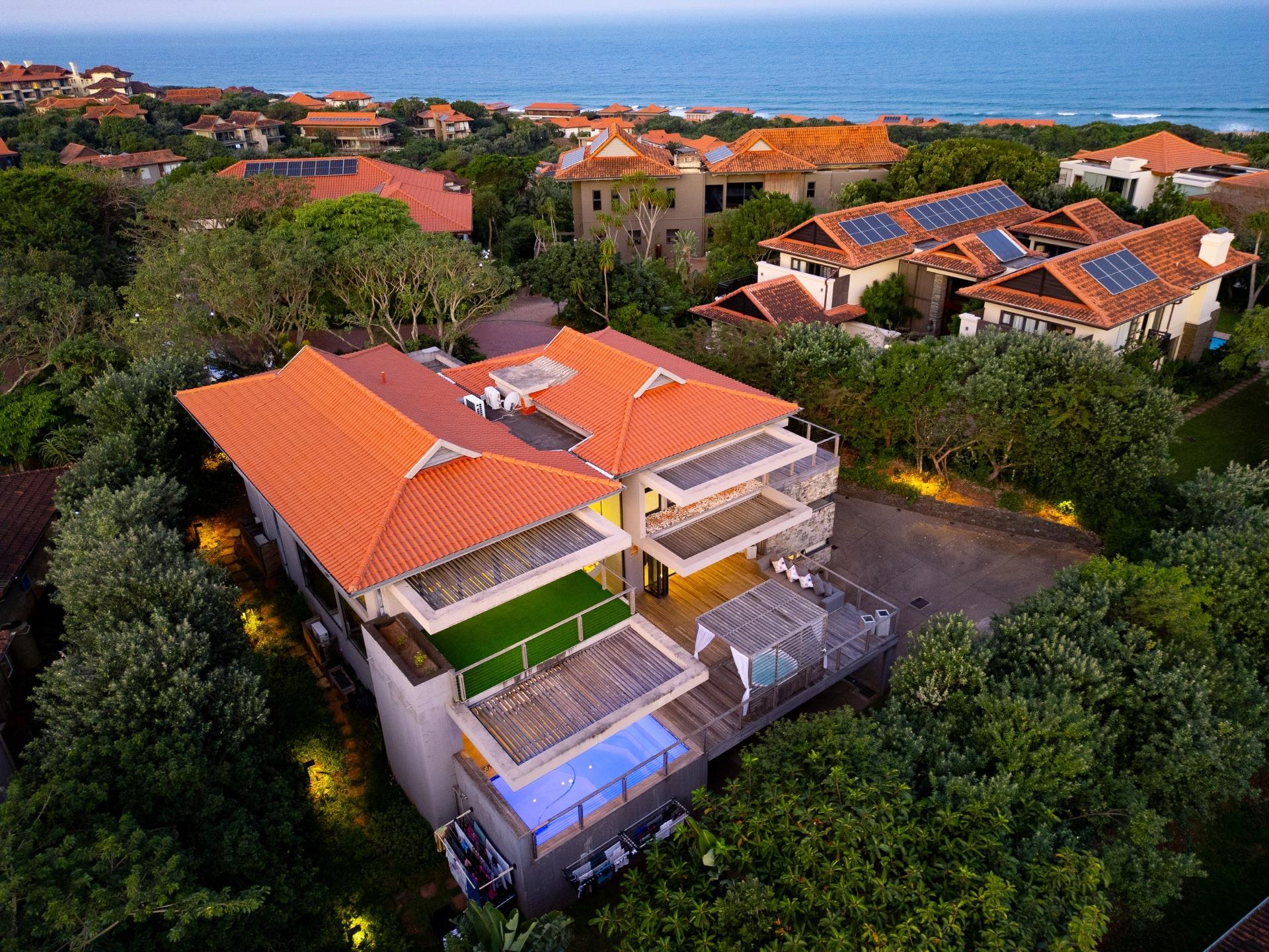 An Elevated Masterpiece of Design, Technology & Luxury Living — photograph 2