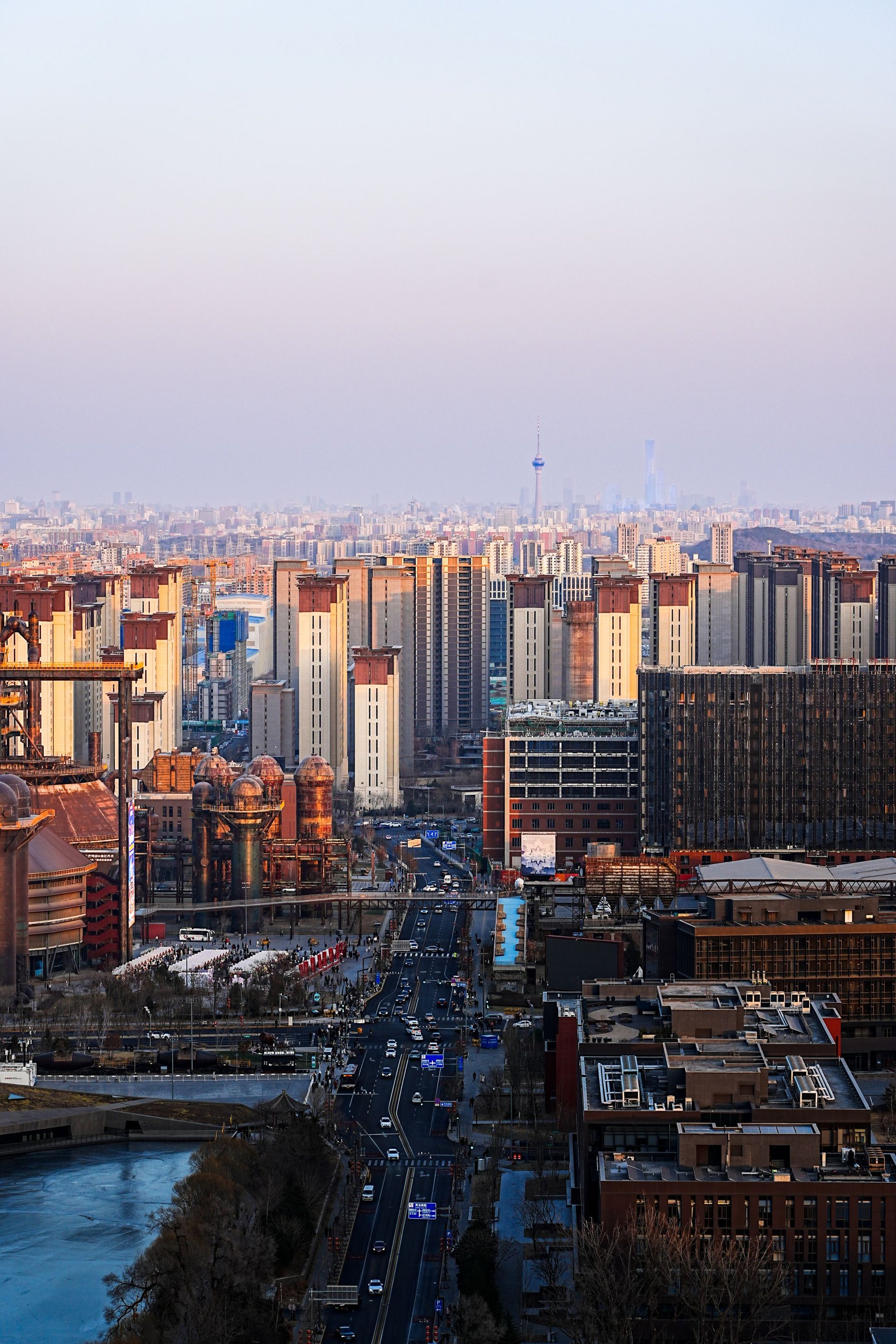 City skyline stretching to the horizon at dusk